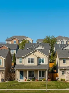 Modern suburban neighborhood with diverse homes, illustrating current housing market trends.
