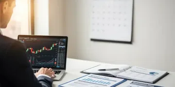 Financial professional reviewing 401(k) plan details for 2026 contribution limits.