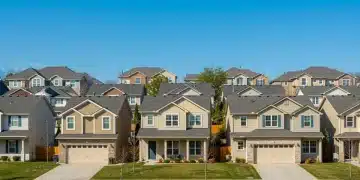 Modern suburban neighborhood with diverse homes, illustrating current housing market trends.